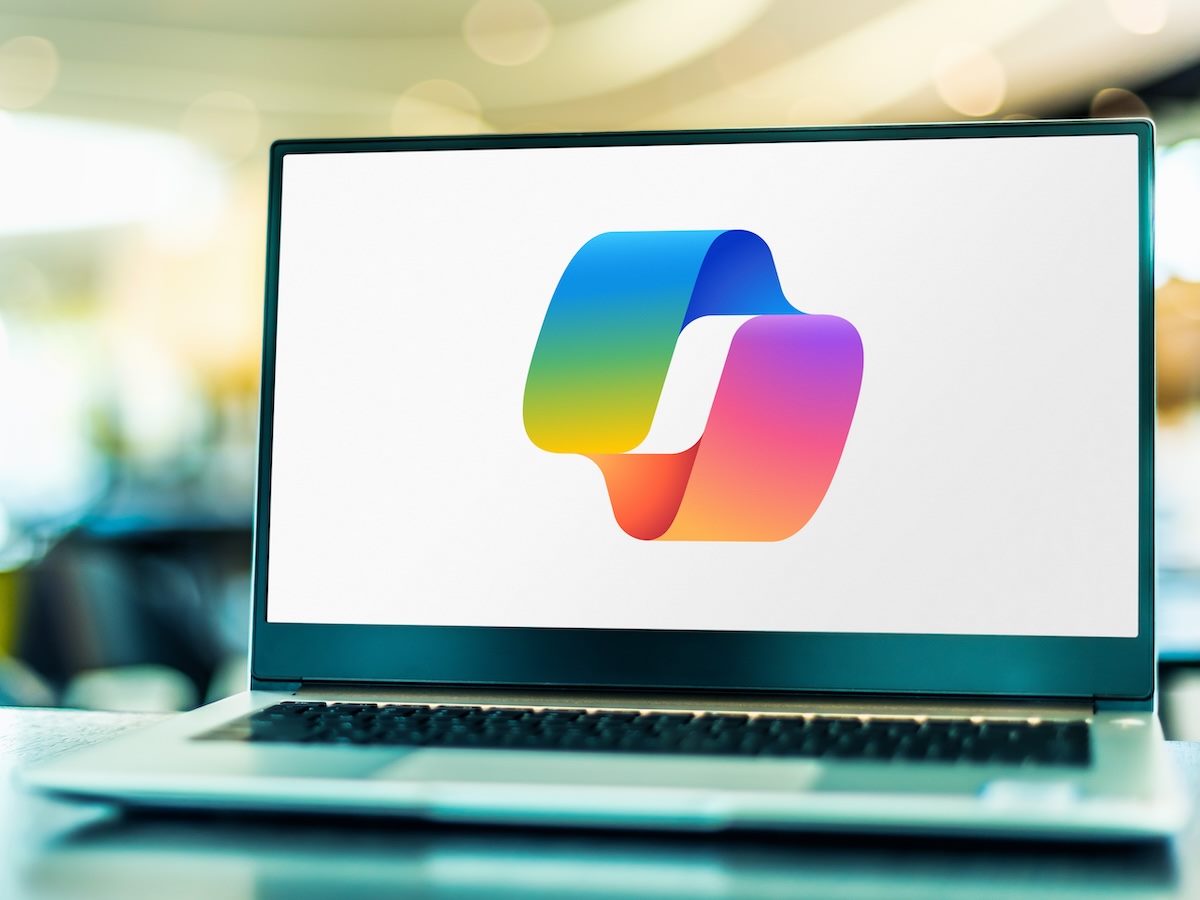 Microsoft 365 Copilot logo on a laptop