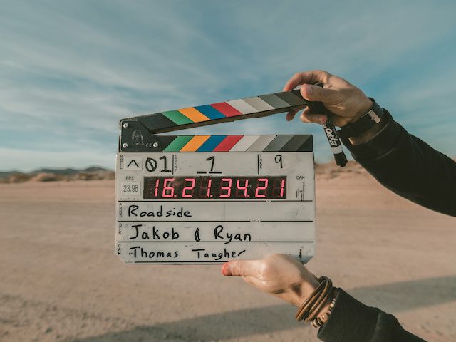 movie clapboard before calling "action"