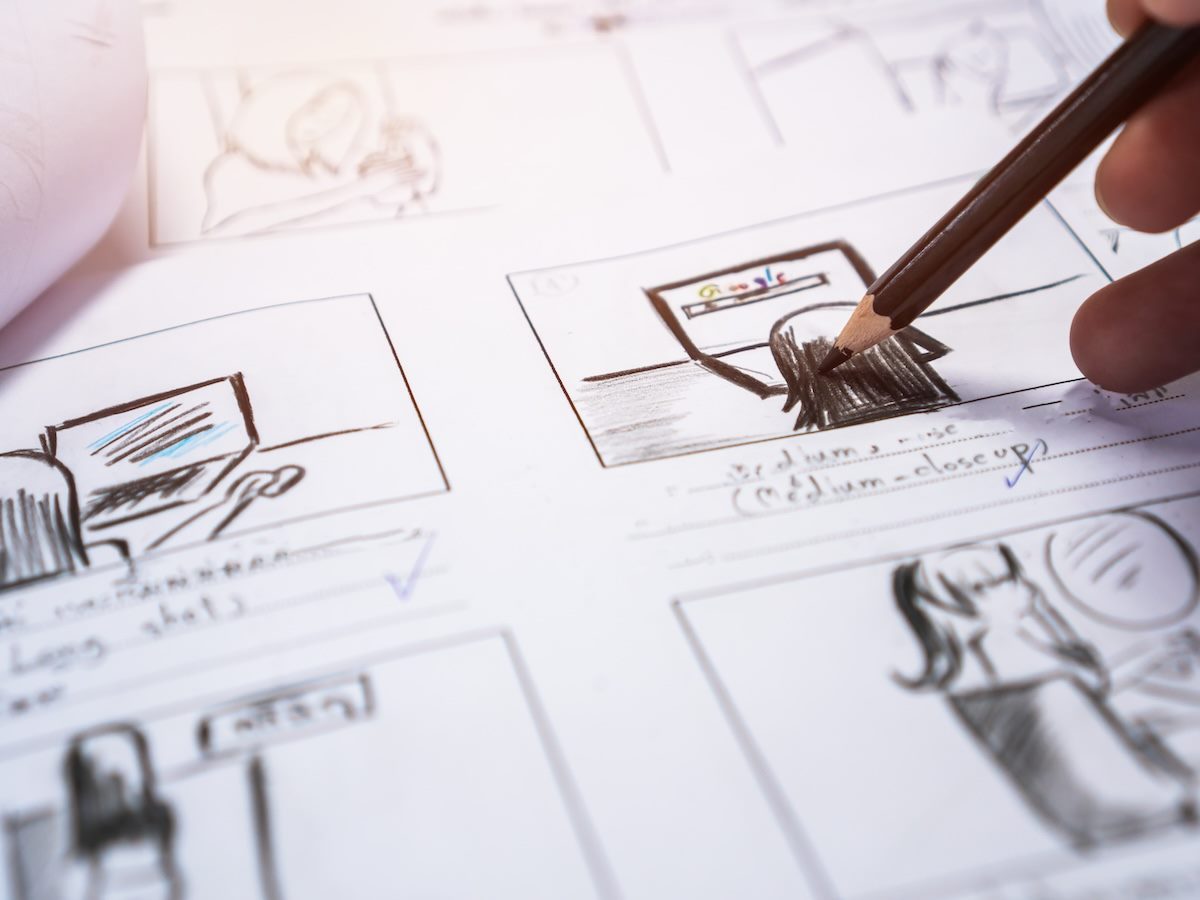 Person drawing a storyboard