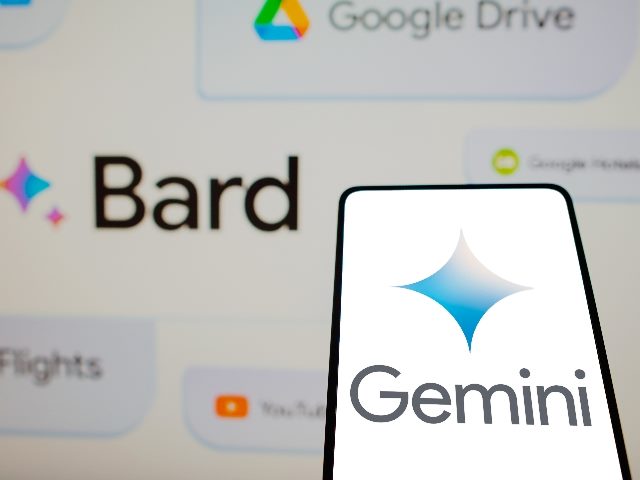 Google Gemini logo is displayed on a smartphone screen with the name Bard in the background on a computer screen in piece about Google renaming Bard Gemini. 