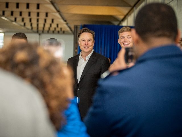 Elon Musk poses for a photo at a US Air Force event. Musk has sued OpenAI. OpenAI called the billionaire’s “incoherent” claims “frivolous.”