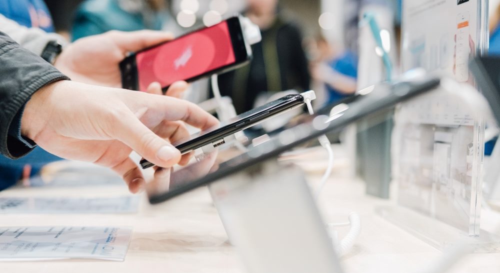 New models of gadgets such as smartphones at the exhibition of technologies in piece about Apple's Ferret potentially in devices and impact on customer experience AA