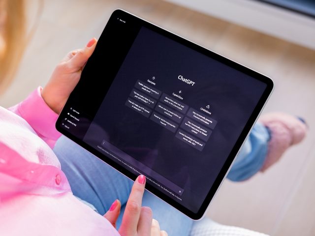 Woman looking at ChatGPT on iPad. OpenAI has released six enhancements to the generative AI chatbot. 