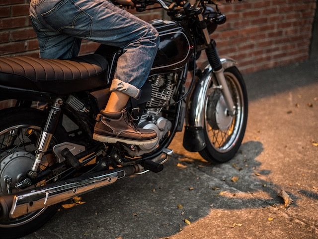 kick starting a  motorcycle