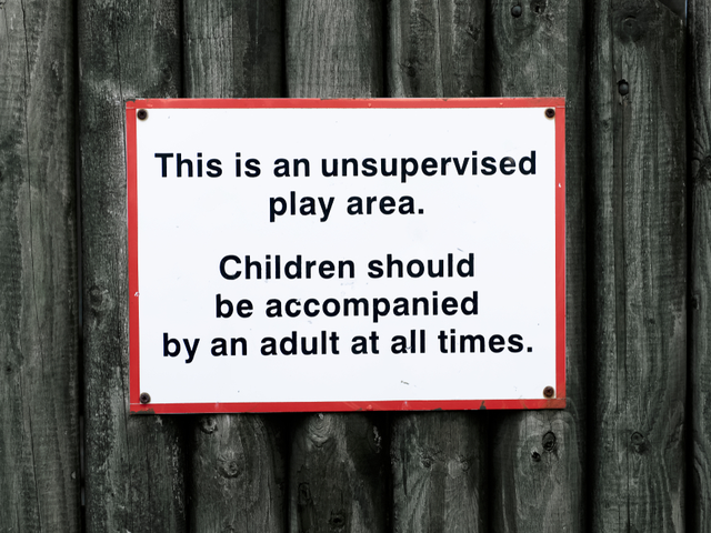 A sign that says, children play area unsupervised accompanied by adult all times - Unsupervised learning concept