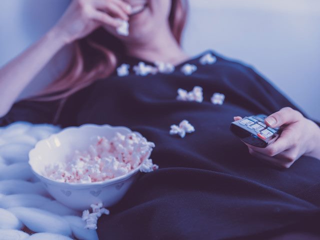 watching netflix while eating popcorn