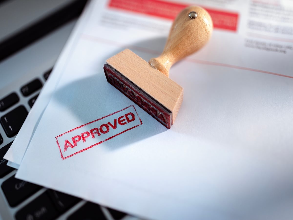 Approved stamp on application form or business agreement document