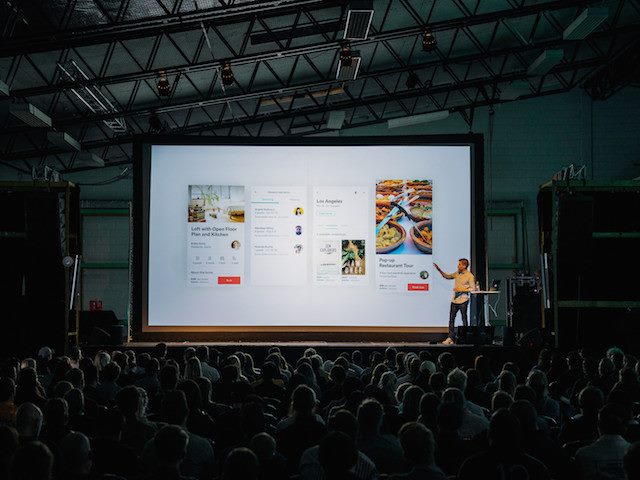making a presentation at a conference