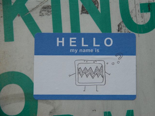 "Hello My Name Is" sticker with drawing on it