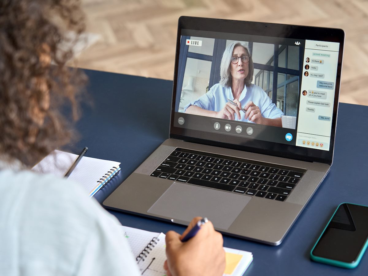 student studying virtual course with remote teacher 