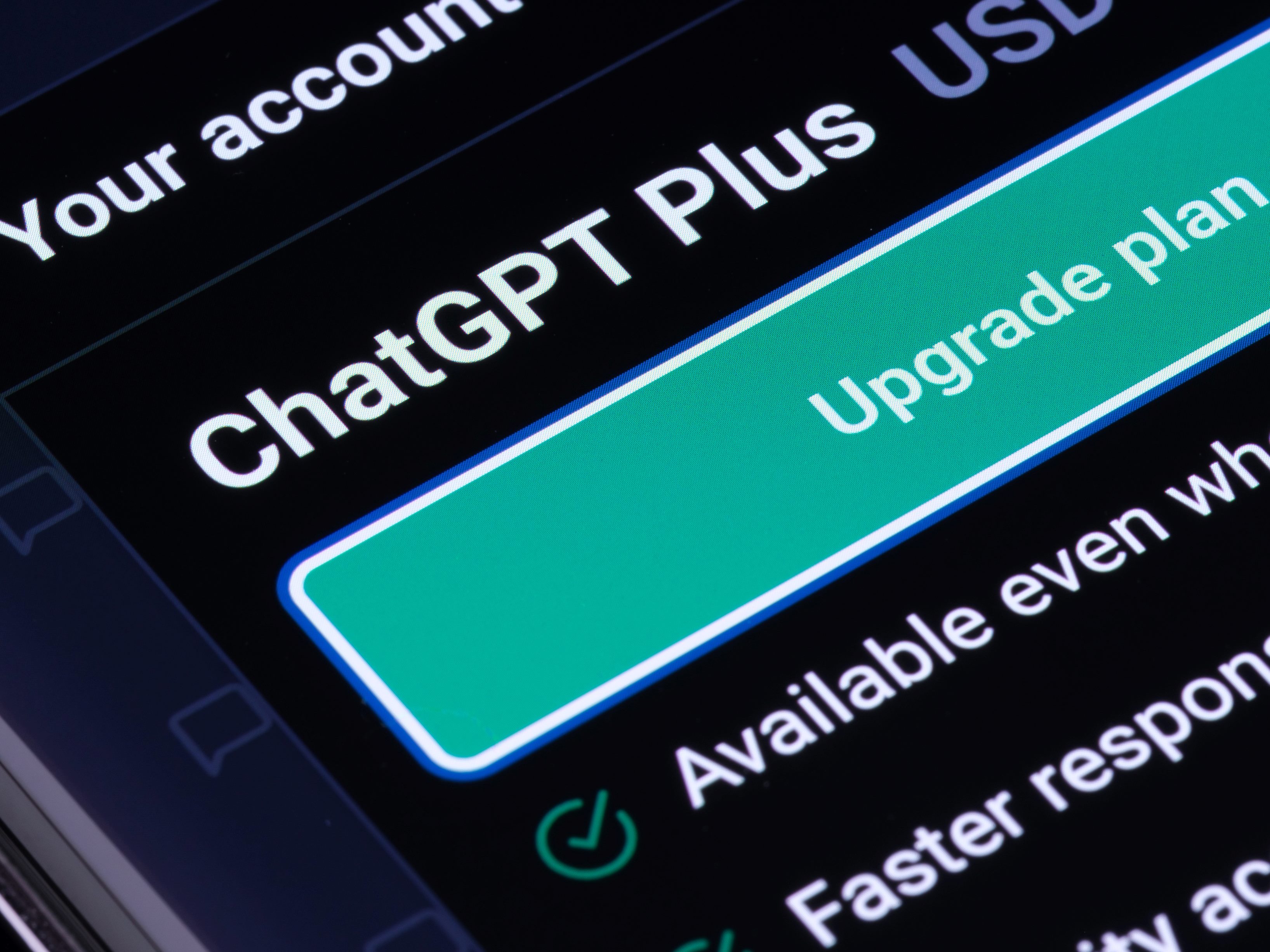 Phone with ChatGPTPlus information showing in white type and turquoise bar that says "upgrade plan."