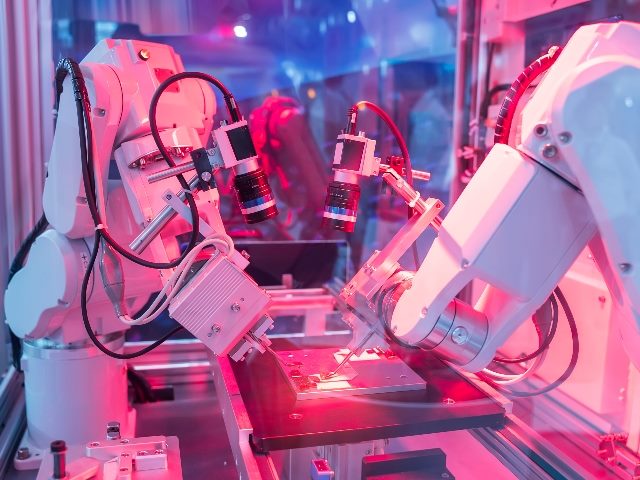 Robotic arm catch for electronic assembly line. 