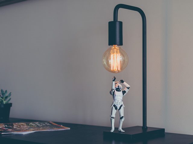 storm trooper reaching for a light bulb