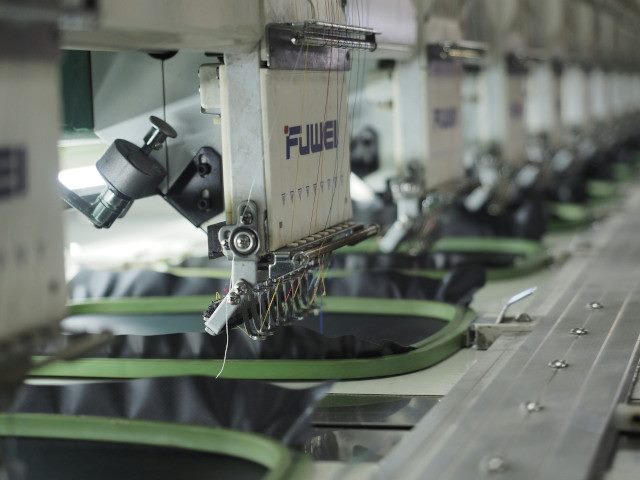 Embroidery machines in a manufacturing factory.