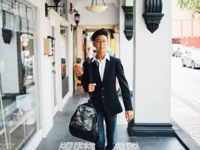 man walking in a retail area