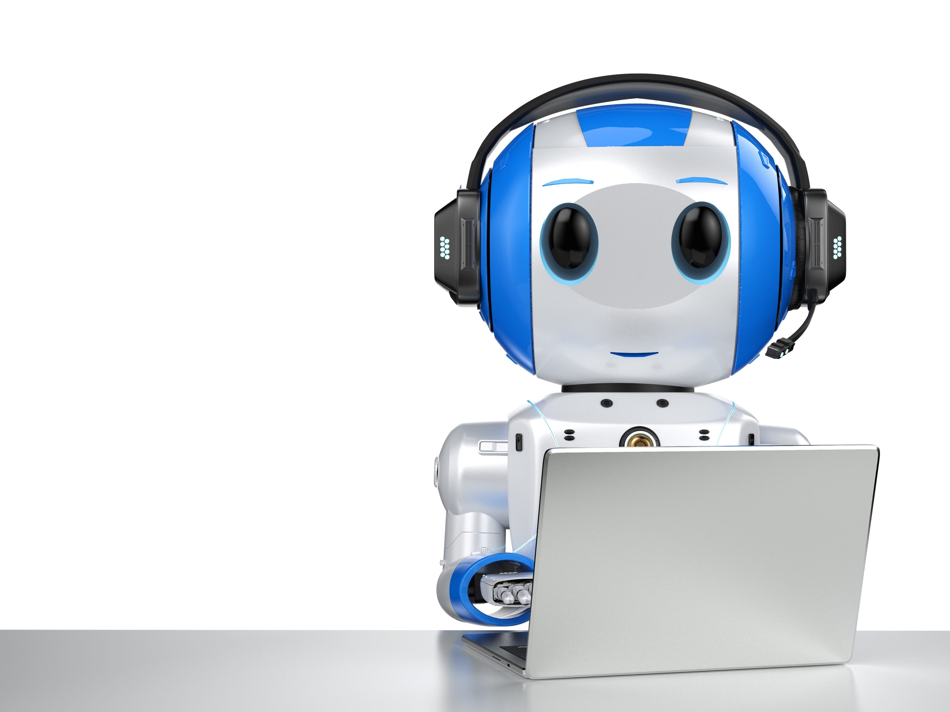 A sliver robot with bright blue accents on its head, on the side and center, wears a black headset and works on a laptop computer. 