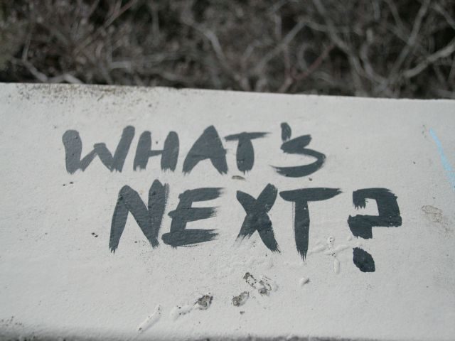 sign with words "what's next" on it
