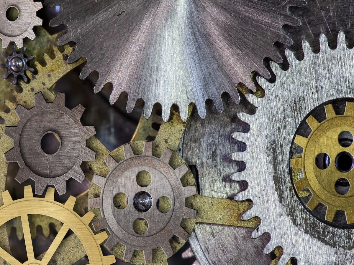 gears and cogs in a clock mechanism