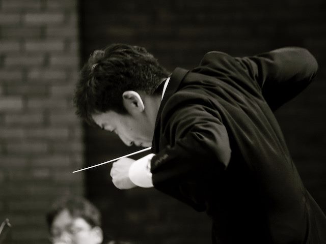 conductor of an orchestra