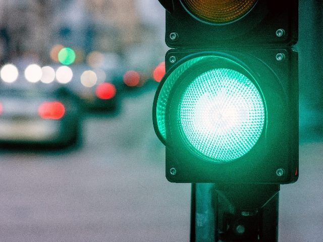 Green light on a traffic light.