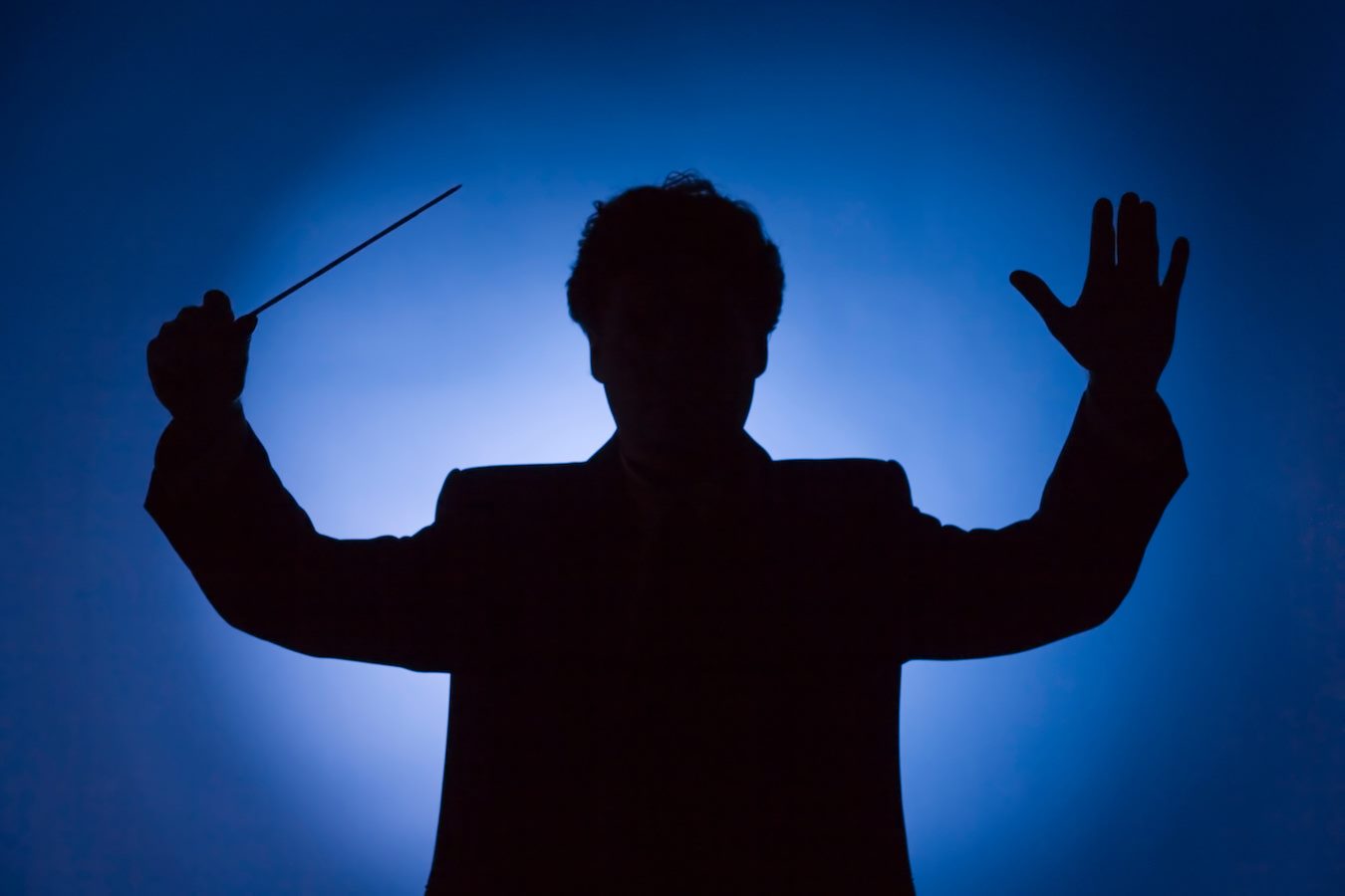 silhouette of conductor