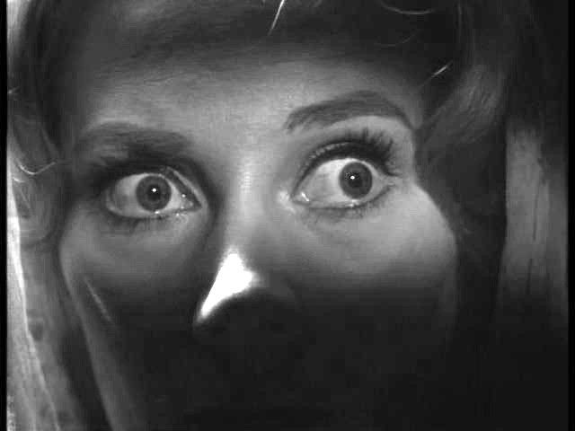 close up of woman's eyes from old school horror movie: fear 