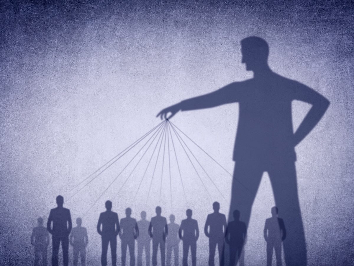 A larger person with multiple smaller people connected on strings