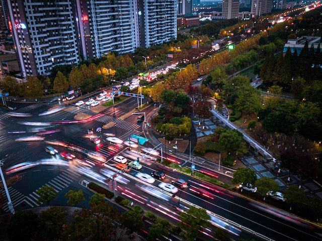busy traffic at an intersection at night