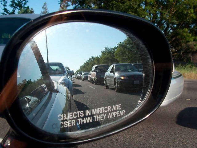 objects in mirror are closer than they appear 