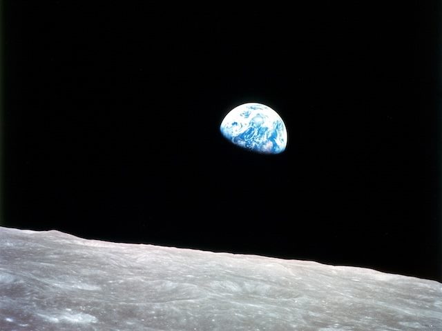 photograph of earth from the Apollo 8 as it orbited the moon