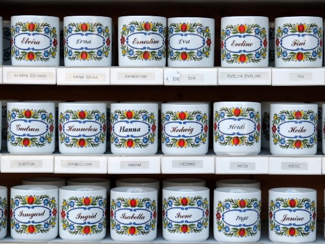 Mugs with names sold in souvenir shop in St. Gilgen on Wolfgang See lake, Austria.