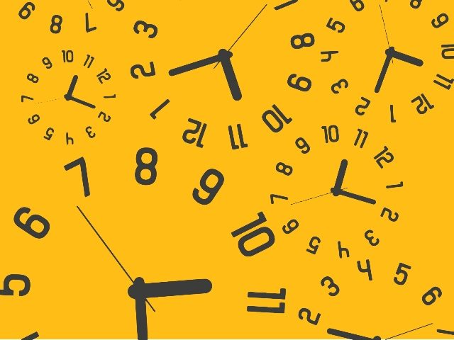 Various clocks with black numbers and black hands placed precariously on to a bright mustard yellow background in piece about real-time interaction management and customer journey orchestration. 