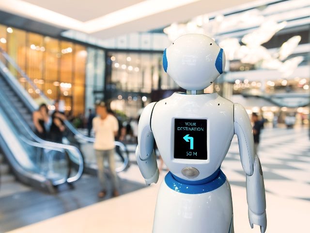 In a smart retail scenario, the shot from behind a robot assistant in a department store.