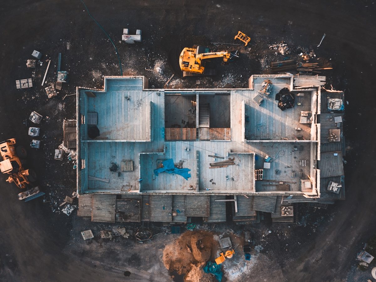 birds eye image of the frame of a house being built on a construction site