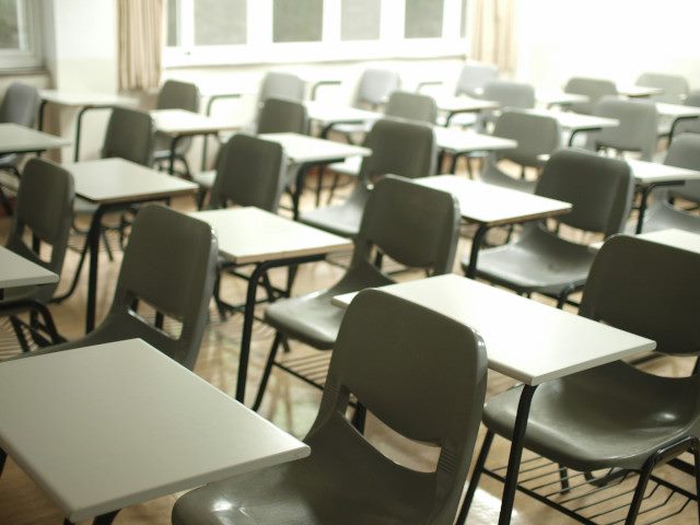 Rows of desks in a classroom.