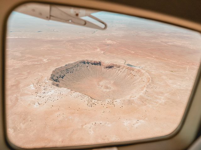 crater as viewed from the window of an airplane
