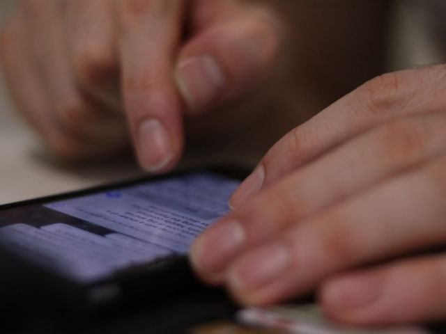 A person using an AI-backed customer service messaging platform