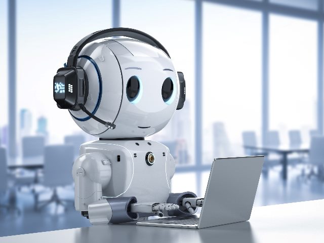 Artificial intelligence robot typing on a laptop.