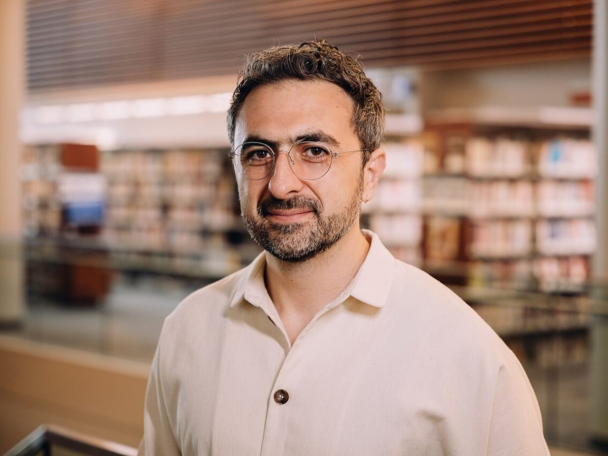 Microsoft AI CEO Mustafa Suleyman headshot.