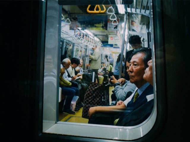 subway passenger, through a window