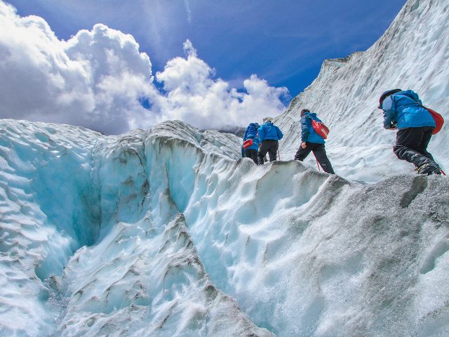 people climbing the mountain