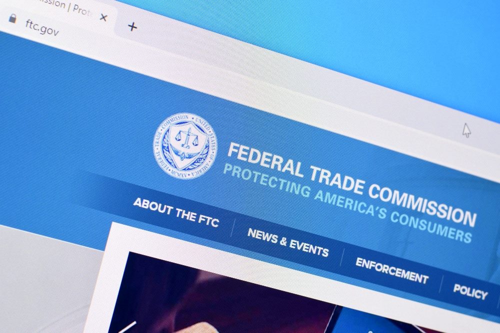 Homepage of the Federal Trade Commission website on the display of computer screen in piece about AI ethics.