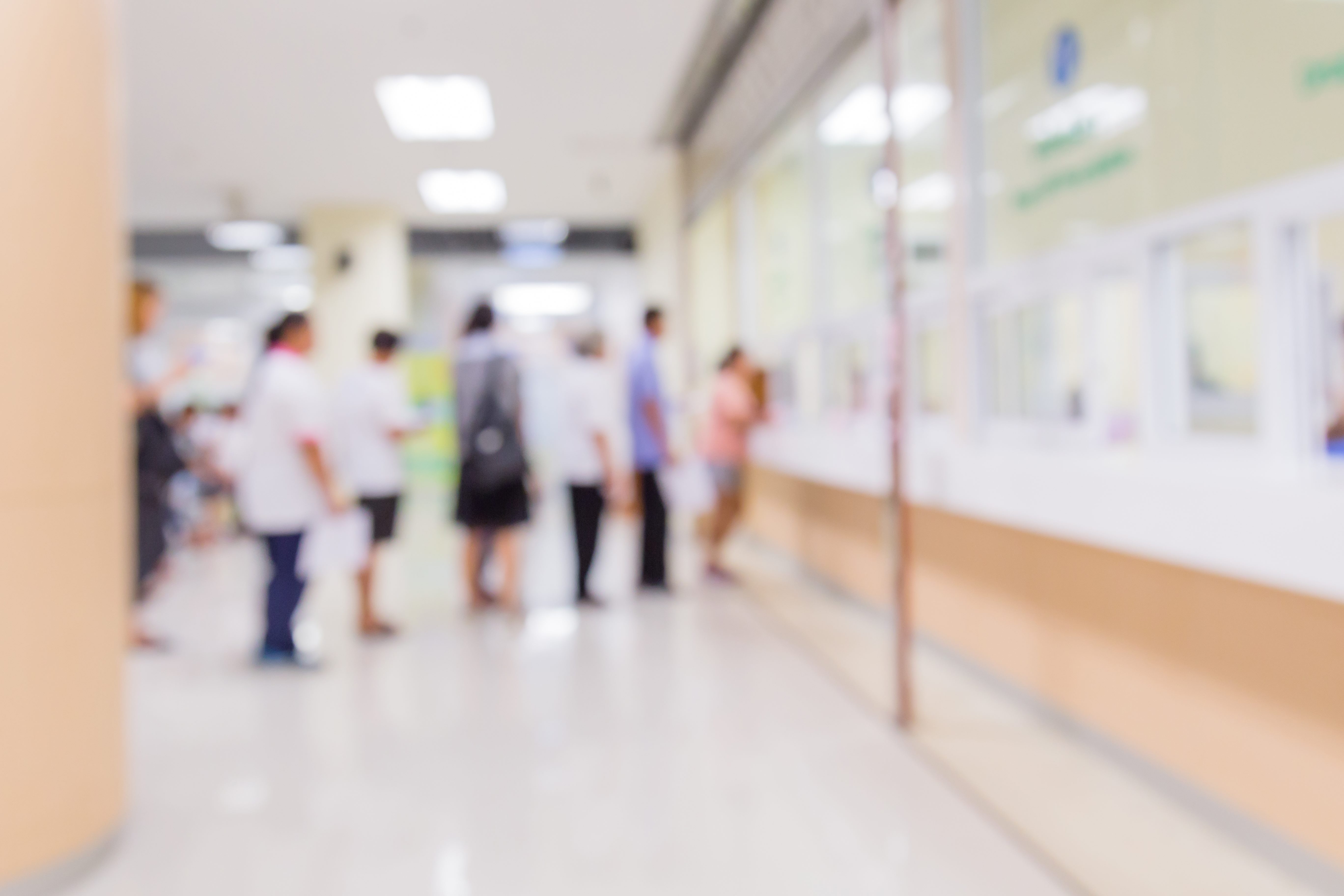 People waiting in line at a hospital
