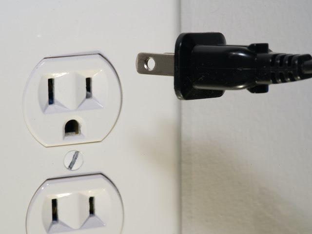outlet  with plug  nearby