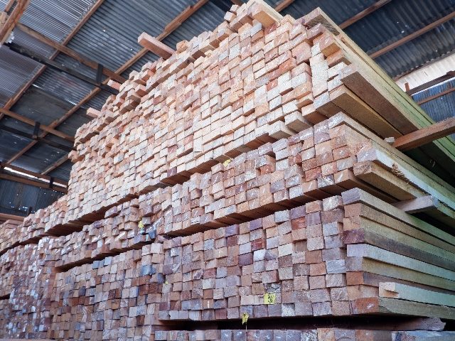 Large pile of wood for house building materials.