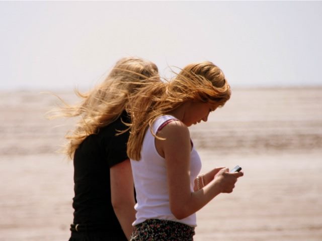texting on the beach