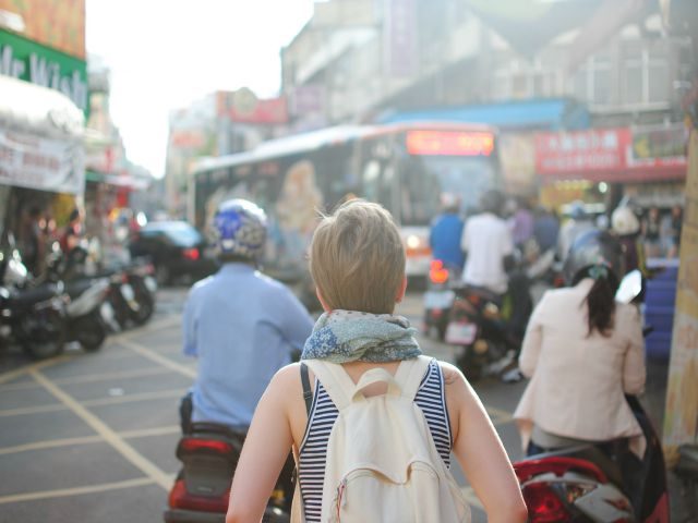 woman lost in a crowd