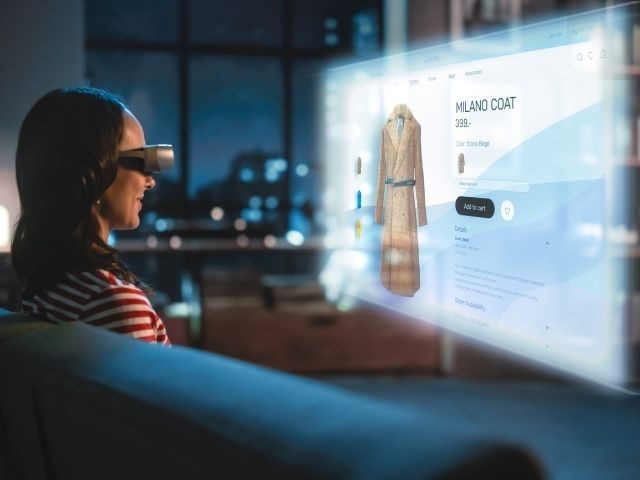 Woman virtually shopping with VR headset on