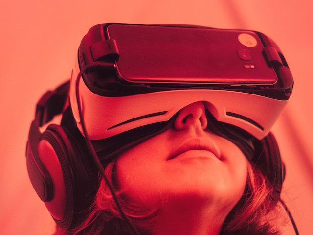woman wearing virtual reality headset