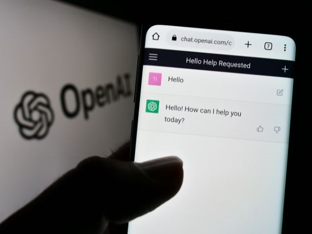 The ChatGPT app open on a smartphone, with the OpenAI logo in the background.